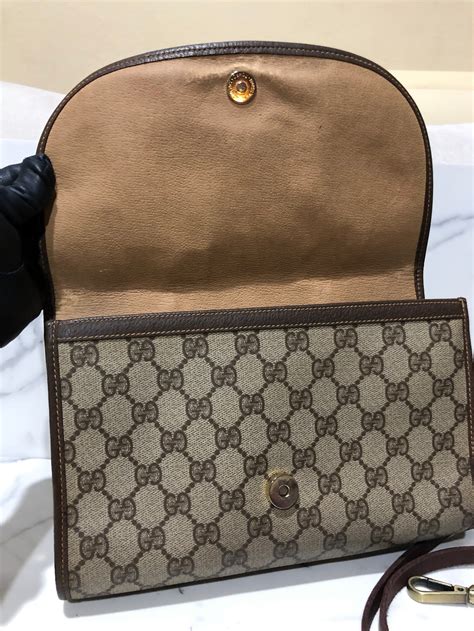 vintage gucci monogram clutch